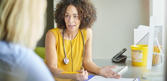 General practitioner with a patient