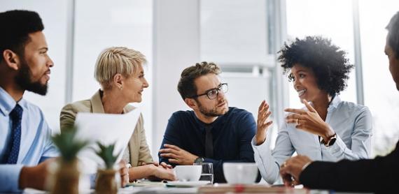 Employees during a meeting in a conference room